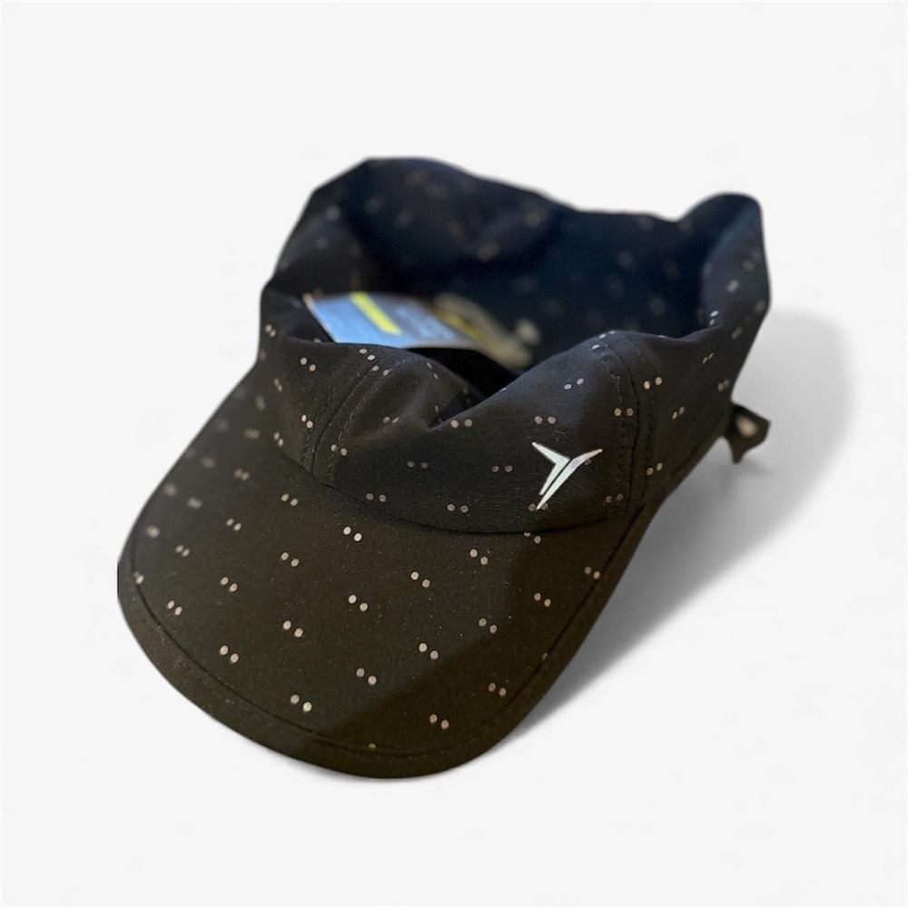 Black old navy Visor with White Dots.